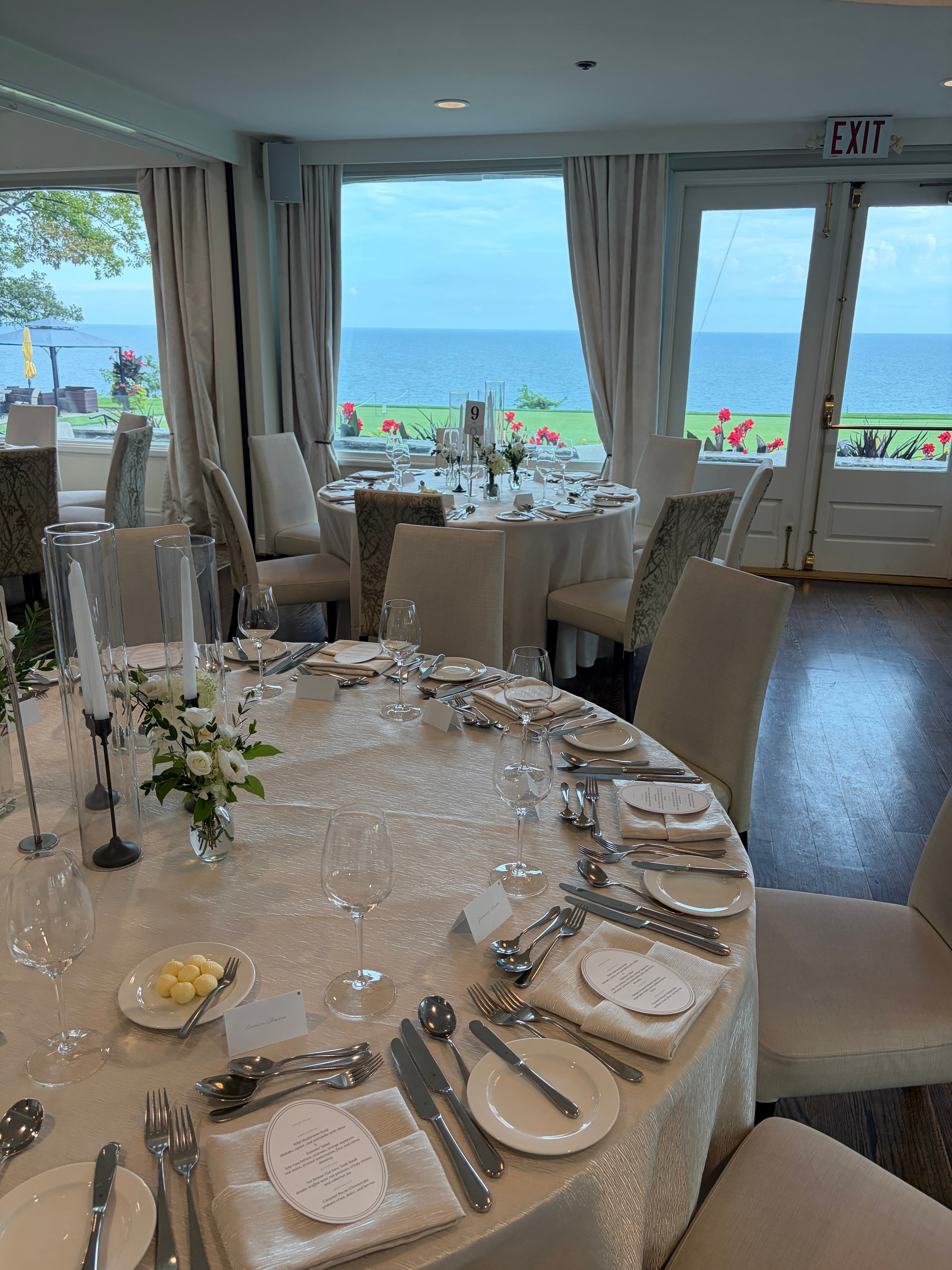 Romantic wedding floral tablescape with ivory candles